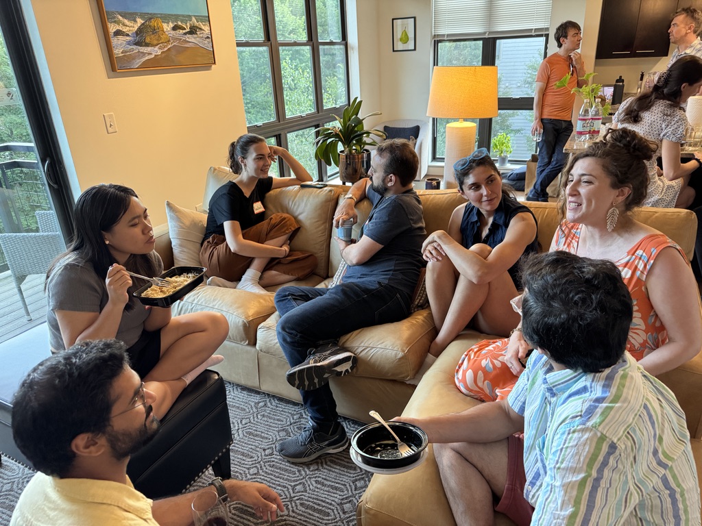 Fractal members chatting and socializing during Sunday dinner